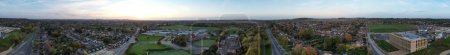 Photo for ENGLAND, LUTON - 26TH OCTOBER, 2022: Beautiful Aerial View of Barnfield College for Higher Education at Barton Road Luton, England. High Angle Drone Camera View During Sunset. - Royalty Free Image