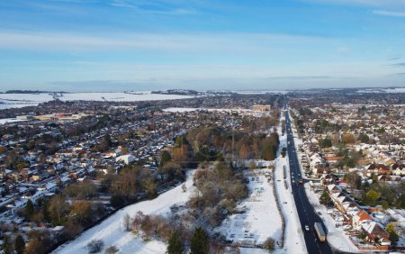 Photo for High angle view of Snow covered landscape and Cityscape, Aerial Footage of Luton City of England UK after Snow Fall - Royalty Free Image