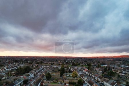 Photo for Beautiful Orange Sunset and Clouds over City - Royalty Free Image