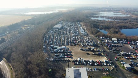 Photo for UNITED KINGDOM, BEDFORD - 6TH FEBRUARY, 2023: Aerial View of Huge and Big Car Parking of Local Car Sales Auctions at Kempston Bedford Town of England United Kingdom - Royalty Free Image