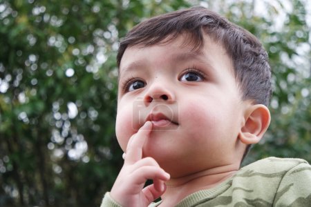 Photo for Portrait of a cute little boy outdoor - Royalty Free Image