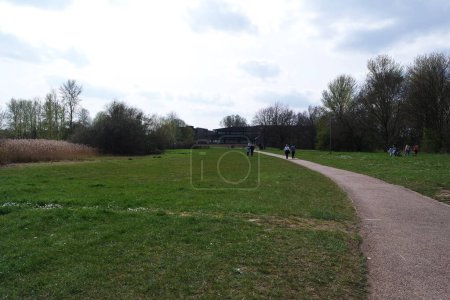 Photo for People at Willen Lake and Park, Milton Keynes, England - Royalty Free Image