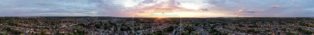 Photo for Aerial View of Luton Town of England during Most Beautiful Orange Sunset and Gorgeous Sky with Colourful Clouds. Image Was Captured with Drone's Camera on July 3rd, 2023 - Royalty Free Image