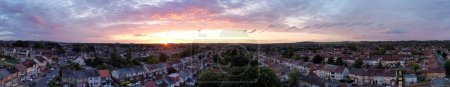 Photo for Aerial View of Luton Town of England during Most Beautiful Orange Sunset and Gorgeous Sky with Colourful Clouds. Image Was Captured with Drone's Camera on July 3rd, 2023 - Royalty Free Image