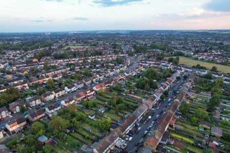 Photo for High Angle View of Luton City of England During Sunrise with Dramatical Clouds over Blue Sky. Image Was Captured with Drone's Camera on July 8th, 2023 - Royalty Free Image