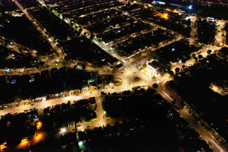 Photo for High Angle Footage of Central Luton City of England During Night. Illuminated City Centre Was Captured with Drone's Camera on July 8th 2023 During Mid Night - Royalty Free Image