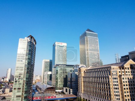 Photo for High Angle View of Canary Wharf Buildings at Central London City of England Great Britain. The Footage Was Captured with Drone's Camera at Low Altitude on June 8th, 2023 - Royalty Free Image