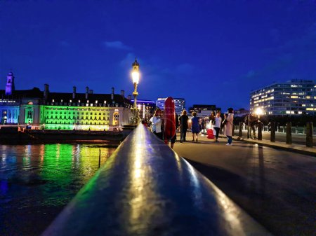 Photo for Beautiful Footage of Illuminated British Road at London eye from River Thames Westminster, Big Ben clock Tower at After Sunset Night. England Great Britain,  Footage Was Captured on Aug 02nd, 2023 - Royalty Free Image
