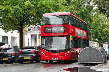Photo for Low Angle view of Bus Service and British Traffic at Central London City of England UK. Image Captured on August 2nd, 2023 During Cloudy and Rainy Day. - Royalty Free Image