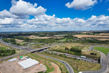 Photo for High Angle View of British Motorways and Highways and Traffic on M1 Junction 11a of Luton and Dunstable England UK. Image Was Captured on August 15th, 2023 - Royalty Free Image