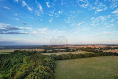 Photo for High Angle Footage of British Agricultural Farms at Countryside Landscape Nearby Luton City of England Great Britain of UK. Footage Was Captured with Drone's Camera on August 19th, 2023 - Royalty Free Image