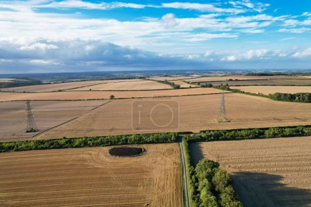 Photo for High Angle Footage of British Agricultural Farms at Countryside Landscape Nearby Luton City of England Great Britain of UK. Footage Was Captured with Drone's Camera on August 19th, 2023 - Royalty Free Image