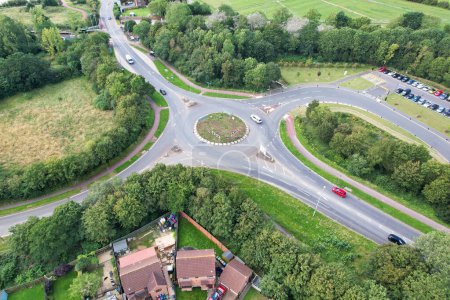 Photo for High Angle view of British Road and Traffic at Milton Keynes City of England UK. Aerial Footage Was captured on August 21st, 2023 with Drone's camera - Royalty Free Image
