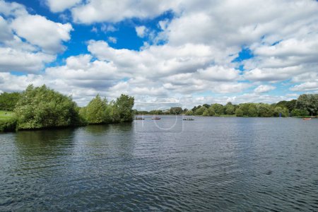 Photo for High Angle footage of People are Boating at Caldecotte Lake Located at Milton Keynes City of England Great Britain UK. The Aerial Landscape Was Captured on August 21st, 2023 with Drone's Camera - Royalty Free Image