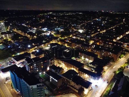 Photo for Aerial View of Illuminated Luton City of England UK after Sunset During Night of Summer. Image Was Captured with Drone's Camera on September 1st, 2023 - Royalty Free Image