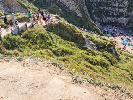 Photo for People at Durdle Door Hills of England Great Britain, UK. Image Was captured with Drone's camera on September 9th, 2023 - Royalty Free Image