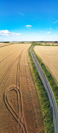 Photo for High Angle View of British Agricultural Farms at Countryside Landscape of England, Great Britain of UK. Image Was Captured with Drone's Camera on August 19th, 2023 - Royalty Free Image