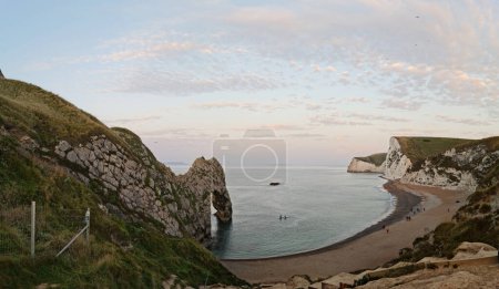 Photo for High Angle View of Cliff and Hills at Durdle Door Beach. Great Tourist Attraction of England and very Famous in Summer. Gorgeous Footage of Most Beautiful Landscape's Image Captured on Sep 9th - Royalty Free Image