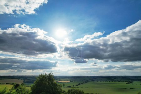 Photo for Most Beautiful High Angle view of Dramatical Sky and Clouds over British Countryside Landscape During Sunset - Royalty Free Image