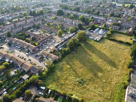 Photo for Aerial View of Residential Homes and Industrial Estate Combined at Dallow Road Near Farley Hills Luton City, England UK. The High Angle Footage Was Captured with Drone's Camera on September 7th, 2023 - Royalty Free Image
