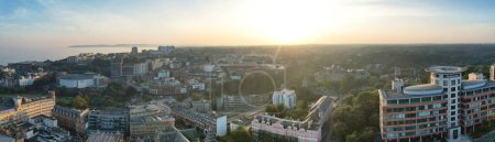 Photo for Aerial Panoramic View of British Tourist Attraction of Bournemouth Beach and Sea view City of England Great Britain UK. High Angle Image Captured with Drone's Camera on September 9th, 2023 During Hot Weather and Sunset. - Royalty Free Image