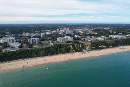 Photo for Aerial View of Most Beautiful and Attractive Tourist Destination at Bournemouth City Sandy Beach of England Great Britain, Image Was Captured with Drone's Camera on August 23rd, 2023 During sunny Day. - Royalty Free Image