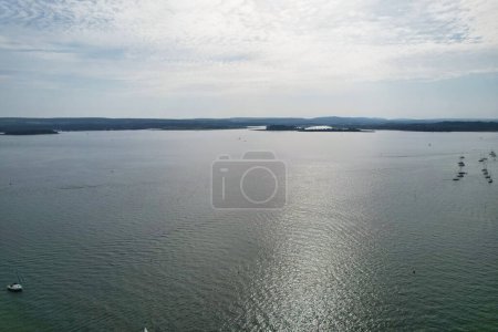 Photo for High Angle Footage of High Speed Boats in the Ocean of Poole Sea View City of England United Kingdom, Beautiful Tourist Attraction Beach City Tour Captured with Drone's Camera on September 9th, 2023 - Royalty Free Image