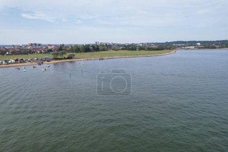 Photo for High Angle Footage of High Speed Boats in the Ocean of Poole Sea View City of England United Kingdom, Beautiful Tourist Attraction Beach City Tour Captured with Drone's Camera on September 9th, 2023 - Royalty Free Image