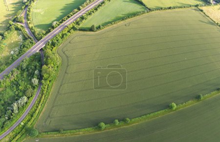Photo for British Agricultural Farms of Sharpenhoe Clappers Countryside Landscape Nearby Luton City of England Great Britain of UK. Footage Was Captured with Drone's Camera on June 24th, 2023 - Royalty Free Image