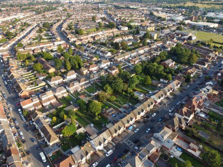 Photo for Aerial View of British City and Residential District at Farley Hills During Gorgeous Sunset over Luton City of England, UK. September 7th, 2023 - Royalty Free Image