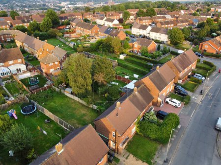 Photo for Aerial View of British City and Residential District at Farley Hills During Gorgeous Sunset over Luton City of England, UK. September 7th, 2023 - Royalty Free Image
