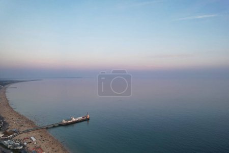 Photo for Aerial View of Most Beautiful and Attractive Tourist Destination at Bournemouth City Sandy Beach of England Great Britain, Image Was Captured with Drone's Camera on September 23rd, 2023 During sunny Day. - Royalty Free Image