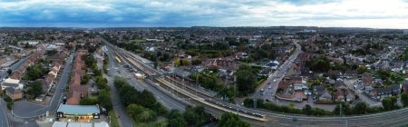 Photo for High Angle Panoramic View of Illuminated Luton City of England During Most Beautiful Colourful Sky and Orange Clouds over England UK. Image Captured with Drone's Camera on October 4th, 2023 - Royalty Free Image