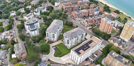 Photo for Aerial Vertical Panoramic View of British Tourist Attraction of Bournemouth Beach and Sea view City of England Great Britain UK. High Angle Image Captured with Drone's Camera on August 23rd, 2023 - Royalty Free Image