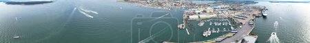 Photo for High Angle View of High Speed Boats in the Ocean of Poole Sea View City of England United Kingdom, Beautiful Tourist Attraction Beach City Tour Captured with Drone's Camera on September 9th, 2023 - Royalty Free Image