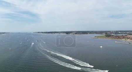 Photo for High Angle View of High Speed Boats in the Ocean of Poole Sea View City of England United Kingdom, Beautiful Tourist Attraction Beach City Tour Captured with Drone's Camera on September 9th, 2023 - Royalty Free Image