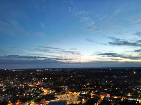 Photo for Aerial View of Illuminated Central Downtown City and Buildings View Just After Sunset. Gorgeous Shot of City Centre of Luton, England UK Was Captured with Drone's Camera on October 24th, 2023 - Royalty Free Image