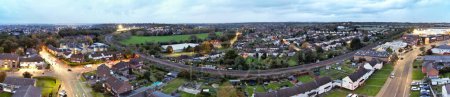 Photo for Aerial View of Illuminated Hitchen Town Just After Sunset. England UK Was Captured with Drone's Camera on October 28th, 2023 - Royalty Free Image