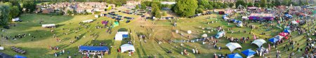 Photo for High Angle Panoramic View of a Funfair with Rides for Local Public of Luton City of England UK. The Funfair Was Held During Holidays to Celebrate Eid Festival of Muslim Community. June 29th, 2023 - Royalty Free Image