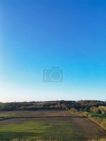 Aerial View of British Countryside Landscape Near Oxford City, Oxfordshire, England UK During Sunrise Morning. March 23rd, 2024