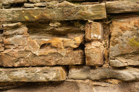 Patrón de pared de piedra rayada y rectangular, textura. fondo y cartografía