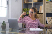 Caucasian woman office worker feeling excited raising fist celebrating career promotion or reward. Businesswoman delighted on receiving good news online using laptop at office workplace   puzzle #619931468
