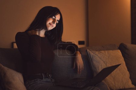 Photo for Stressed woman at late night having strong terrible neckache attack after computer laptop study, sleepy exhausted girl suffering from chronic migraine massaging muscle to relieve neck ache tension - Royalty Free Image