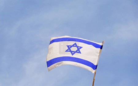 Photo for 75 years since the founding of the State of Israel.Flag of Israel. State symbol.Flag of Israel on the background of the Wailing Wall. - Royalty Free Image