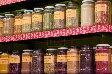 Photo for Spices on a shelf in the pantry with the name that identifies them. - Royalty Free Image