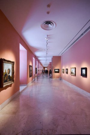 Photo for MADRID SPAIN - October 25, 2023: Room of the Thyssen Bornemisza national museum in Madrid with several people in the background. - Royalty Free Image