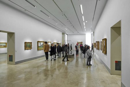 Photo for MADRID SPAIN - October 25, 2023: Very large room of the Thyssen Bornemisza national museum in Madrid with several people in it. - Royalty Free Image