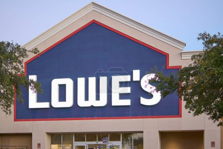 Photo for Florida, USA - March 23, 2024: Evening view of the exterior of Lowe's, highlighting a variety of outdoor equipment and plants available to customers looking for quality products. - Royalty Free Image