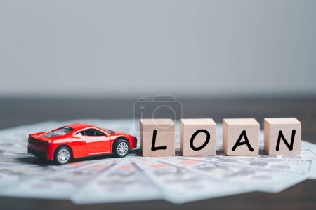 Photo for Car, house, personal money loan concept. finance business icon on wooden cube. saving money for a car. money and House. Wooden cubes with word loan. Copy space for text. Loan payment car and house. - Royalty Free Image