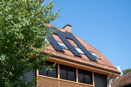 A residence with solar panels integrates green technology with modern living, capturing the essence of environmental consciousness in residential design. High quality photo